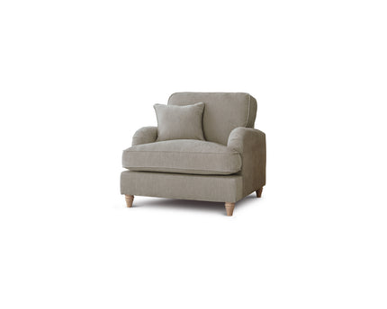 Beige armchair with a pillow on a white background