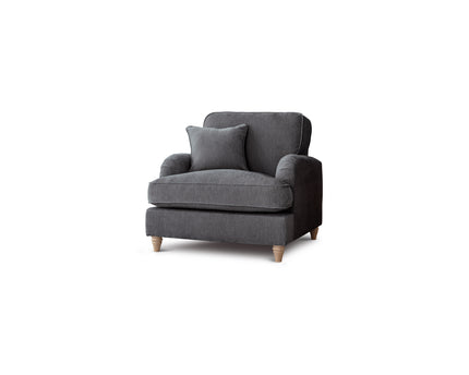 Gray armchair with a cushion on a white background
