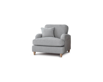 Gray armchair with a pillow on a white background