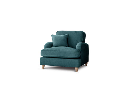 Teal armchair with a cushion on a white background